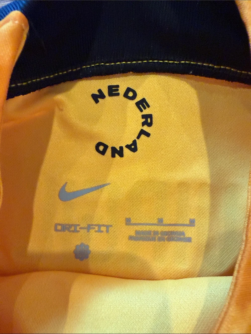 Nike Kids Netherlands Yellow-Orange Soccer Jersey with Black Accents Size Medium